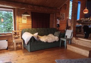 Storstugan, bäddsoffan/The sofa bed in the living room. Storstugan, bäddsoffan/The sofa bed in the living room.